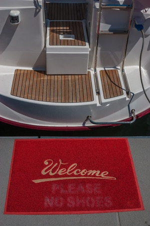 A welcome mat at the aft of a boatの写真素材