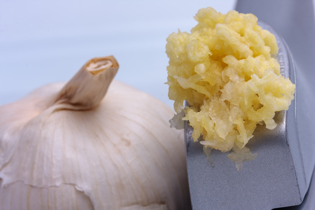 Minced garlic, press and bulbの写真素材