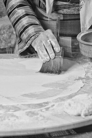 Greek traditional bread or pie making retroの写真素材