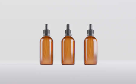 Amber Dropper Bottles Mockup 3D Illustrationの写真素材