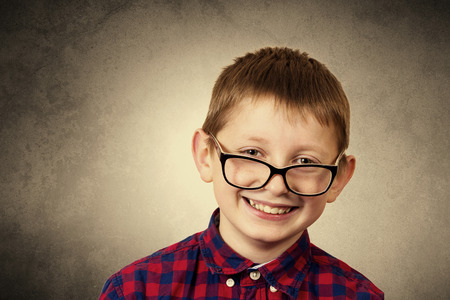 isolated fun white boy expression sign happiness flexing male people one surprised caucasian excitement cute portrait smile funny emotionally excited emotion lifestyle young face laughing person childhood showing playful joy poster banner kid pointing looの写真素材