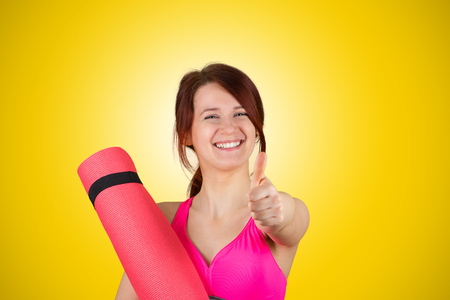 Thumb up healthy womanの写真素材