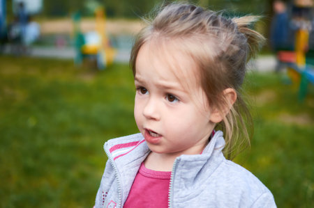 Little irritated child girl showing frustration and disagreementの写真素材