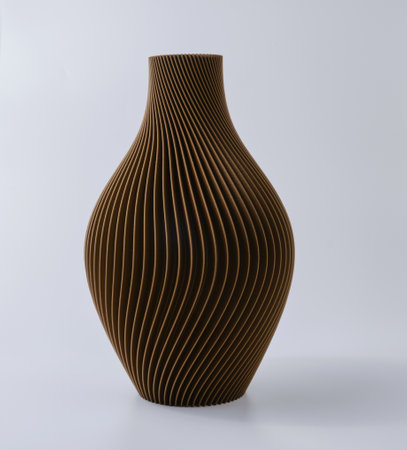 3D printed brown vase home decor with a flowing geometric texture Decorative Vase For Dried Flowers made from recycled plastic isolatedの写真素材