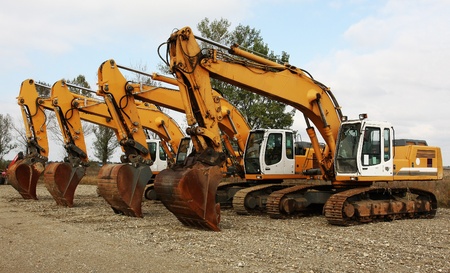 Excavators at workplace 