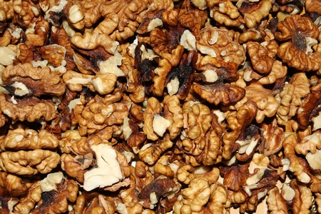 Peeled walnuts background