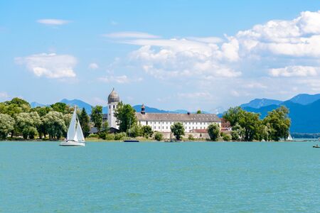 Fraueninsel, Frauenchiemsee on lake Chiemsee with boat, Sailboat, church, monastery. Bavaria,...