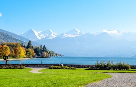 Amazing postcard view on Thun Lake (Thunersee, Thuner See), alps mountains Eiger, Jungfrau, Monch (Moench, MÃ¶nch). Thun, Canton Bern, Switzerland.の写真素材