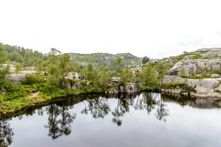 Lake on the way to Preikestolen or Prekestolen pulpit rock,  famous attraction near Stavanger. Norwayの写真素材