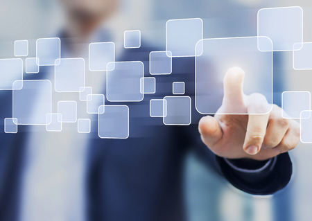 Abstract business concept, businessman touching a button on a virtual interface, technology