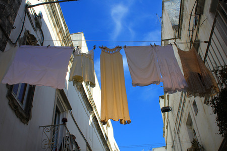 laundry clothes hang up on the balconyの写真素材