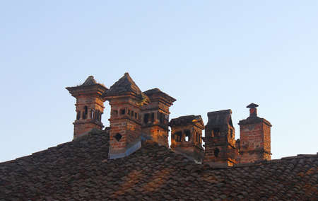 chimney made with bricks on the roofの写真素材