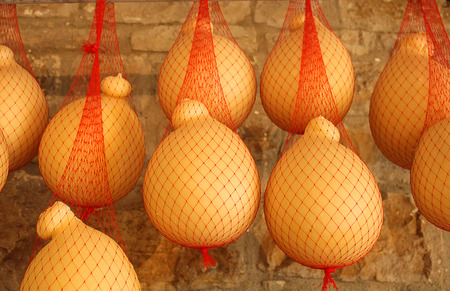 forms of cheese in the bagsの写真素材