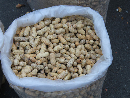 bag with peanuts in the market