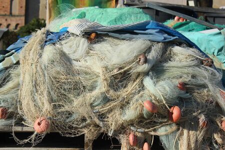 a fishing net in front of the sea