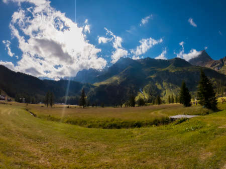Alpine summer landscape at sunsetの写真素材