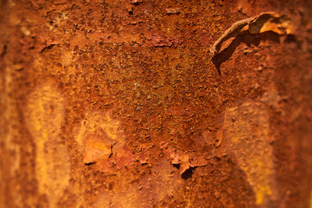 Rust on a pillar closeup. Rust texture