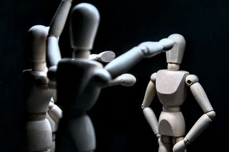 Drawing mannequins in the act of insult one of them that is acting indifferent