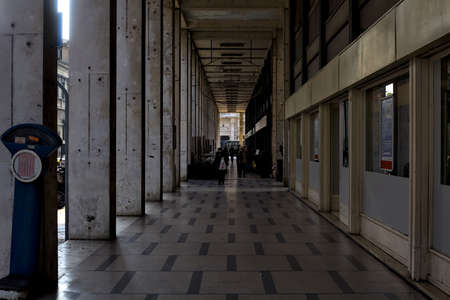 Porchway under a modern building during daytimeの写真素材