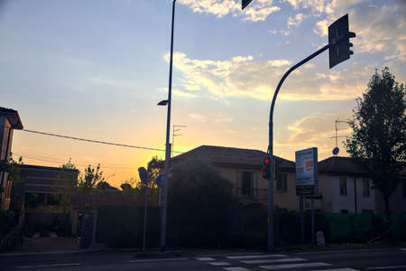 Pedestrian crossing in the outskirt of an italian town at sunsetの写真素材