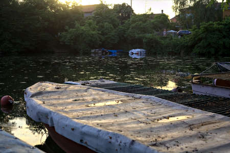 Boats in an inlet at sunset