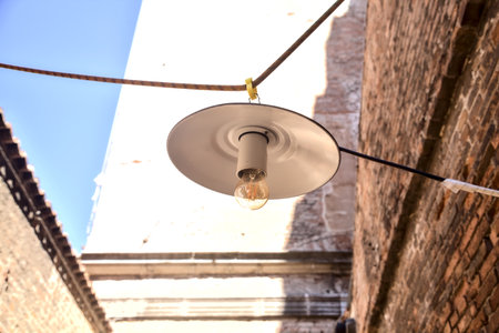 Chandelier hanged by ropes at daytime