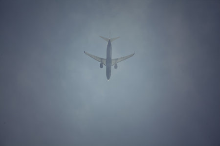Airplane in the sky on a clear sky as background