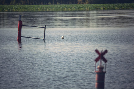Buoy on a lake at sunset