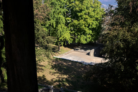 Small square partly in the shade in a park