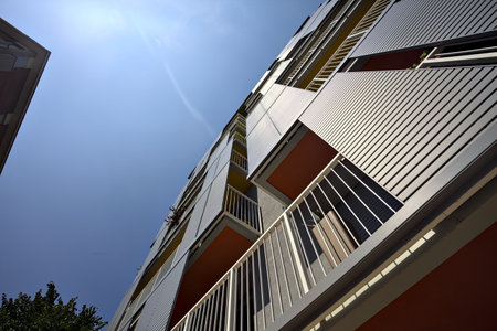 Facade of a condominium on a clear sunny dayの写真素材