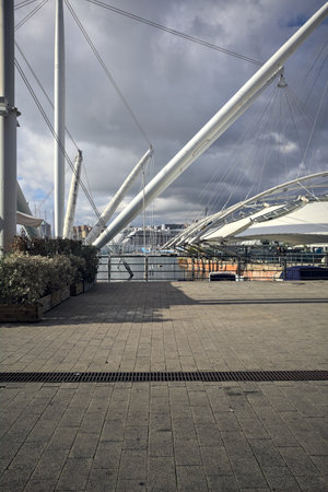 Tensile structure by the waterfront on a harbor by the sea on a sunny dayの写真素材