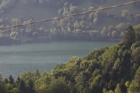 Lake in the mountains at morning seen from above