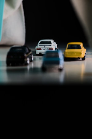 Mantua, Italy - 14TH DECEMBER 2025 - Replicas of various BMW pretending to have a race under an icy...