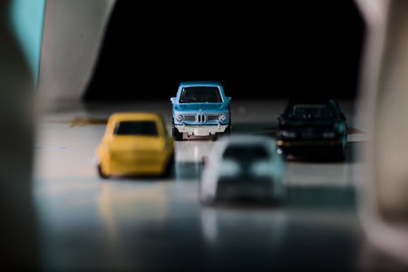 Mantua, Italy - 14TH DECEMBER 2025 - Replicas of various BMW pretending to have a race under an icy...