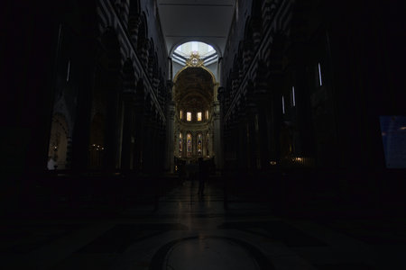 Genoa, Italy - 12TH NOVEMBER 2025 - Central nave of San Lorenzo church with altar in the distance and sunlight filtering by windows aboveのeditorial素材