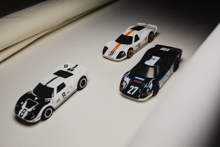 Mantua, Italy - 28TH DECEMBER 2025 - Hot Wheels replicas of two Ford GT40 Mark IV, one in a green...