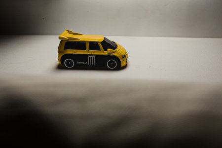 Mantua, Italy - 28TH DECEMBER 2025 - Hot Wheels replicas of a Renault Espace F1 in yellow and black...
