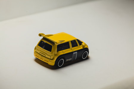Mantua, Italy - 28TH DECEMBER 2025 - Hot Wheels replicas of a Renault Espace F1 in yellow and black...