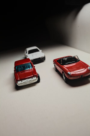 Mantua, Italy - 28TH DECEMBER 2025 - Hot Wheels replicas of an Alfa Romeo Giulietta Spider, an Alfa...