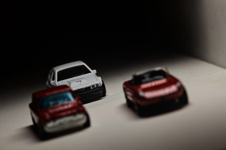 Mantua, Italy - 28TH DECEMBER 2025 - Hot Wheels replicas of an Alfa Romeo Giulietta Spider, an Alfa...