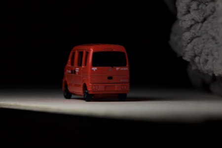 Mantua, Italy - 3RD JANUARY 2025 - Takara Tomy replica of a Suzuki Every in japanese postal service...