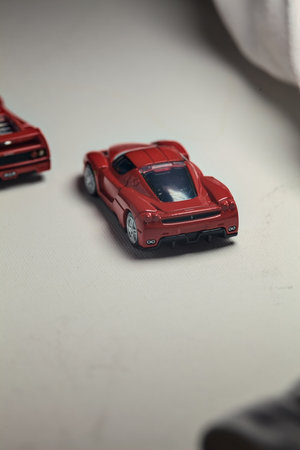 Mantua, Italy - 4TH JANUARY 2025 - Takara Tomy replicas of a Ferrari F40 and a Ferrari Enzo Ferrari...