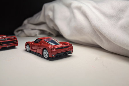 Mantua, Italy - 4TH JANUARY 2025 - Takara Tomy replicas of a Ferrari F40 and a Ferrari Enzo Ferrari...