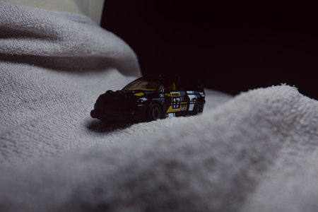 Mantua, Italy - 10TH JANUARY 2025 - Hot Wheels replica of a Ford Escort in black livery and rally...