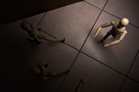 Wooden mannequin in the act of raising its arms and running towards other three mannequins in the act of escaping from itの写真素材