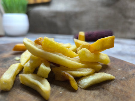 Close-up with French fries and delicious sausage. high quality photos.の写真素材