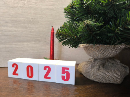 The red numbers 2025 on the white Christmas cubes.の写真素材