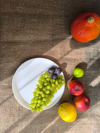 variety of fresh fruits laid out on a wooden table. High quality photosの写真素材