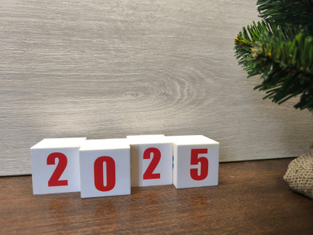Wooden block calendar for new year on wooden table background.の写真素材