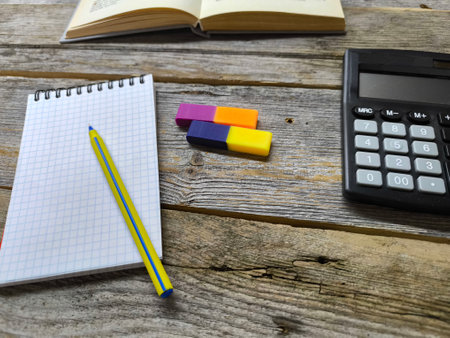 office supplies on a wooden work table.の写真素材